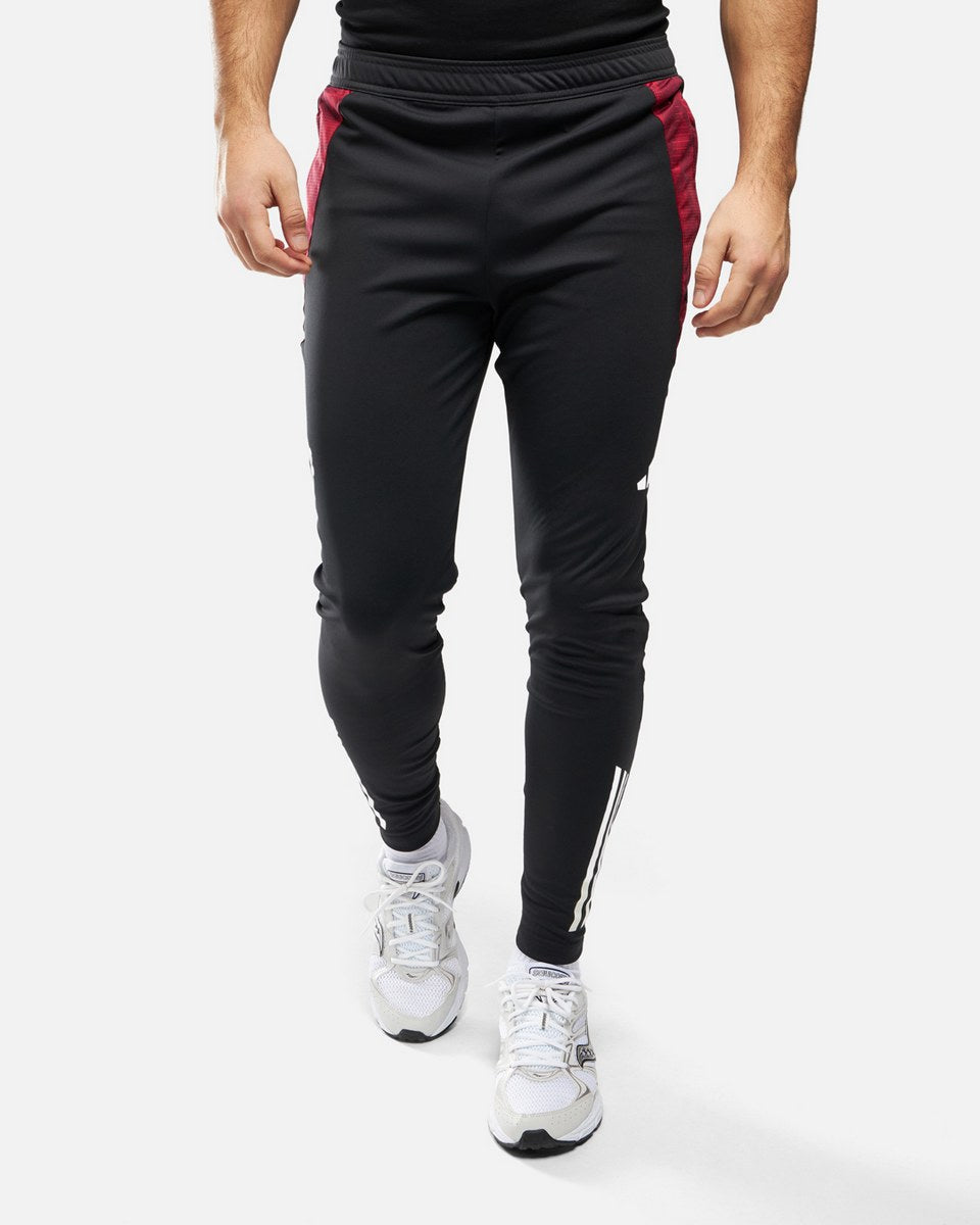 Pantalon d'entrainement Manchester United 2024/2025 - Noir/Rouge