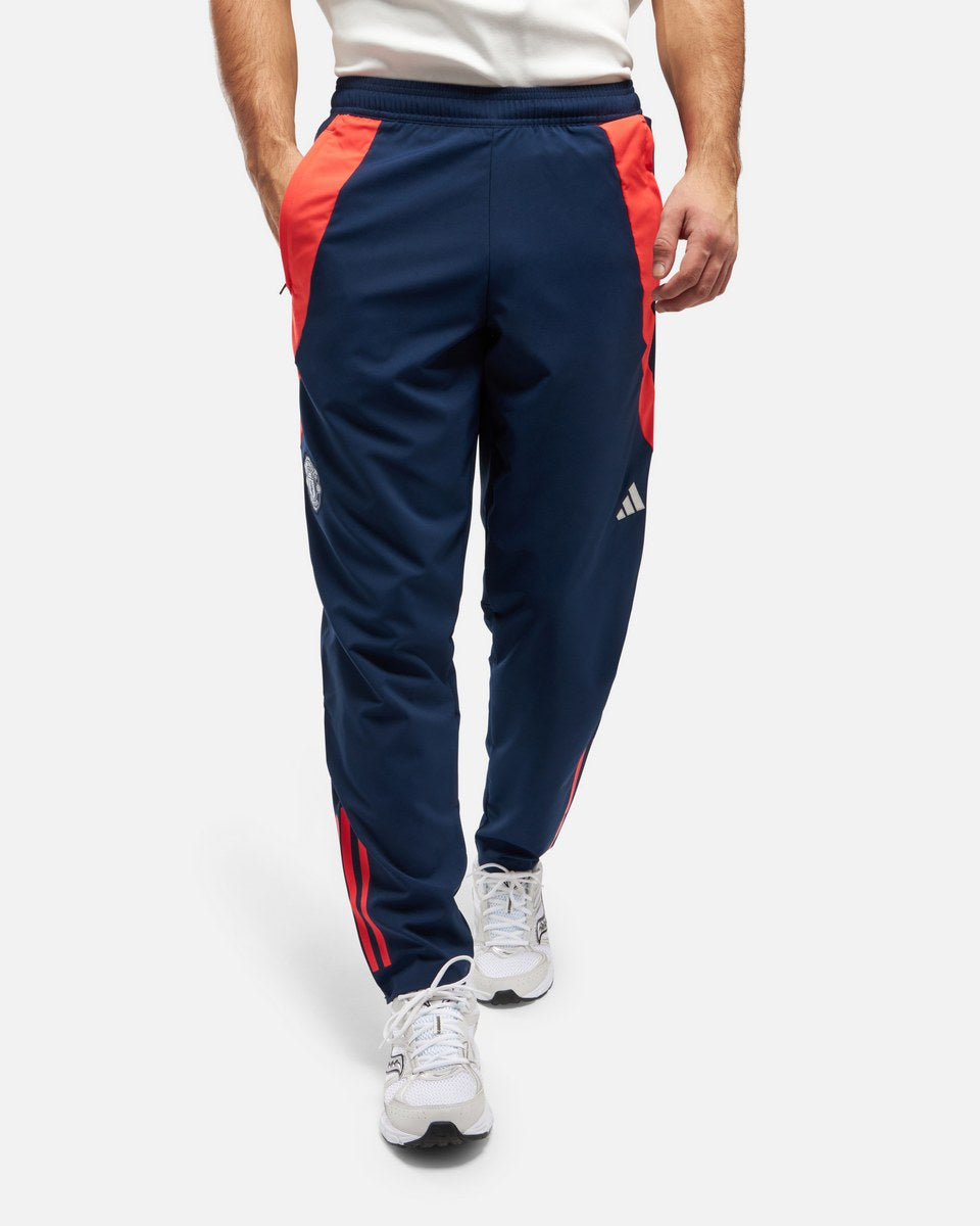Pantalon de survêtement Manchester United 2025 - Bleu/Orange