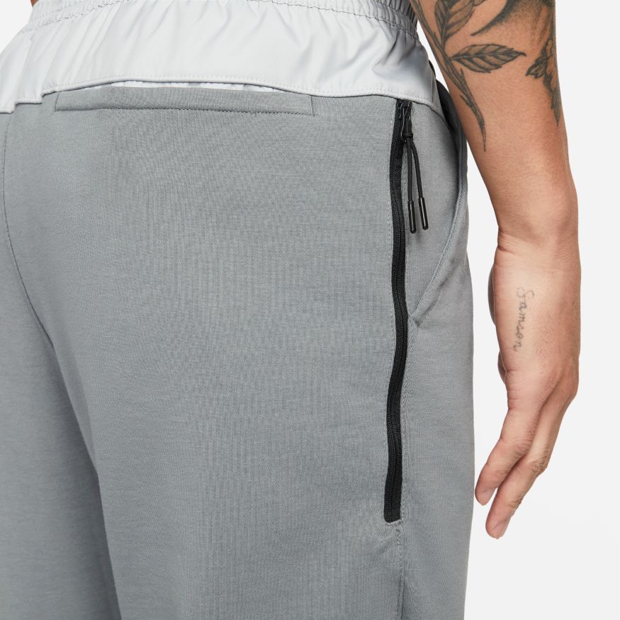 Pantalon Nike Sportswear Tech Essentials - Gris