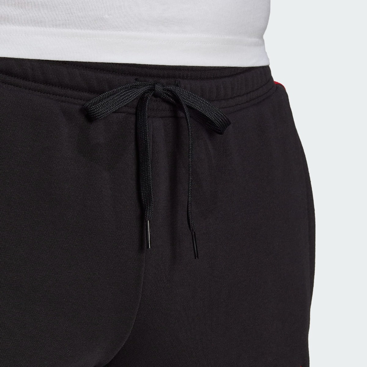 Pantalon d'entrainement Manchester United - Noir/Rouge/Blanc