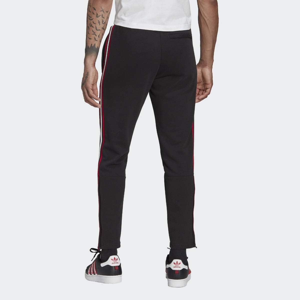 Pantalon d'entrainement Manchester United - Noir/Rouge/Blanc